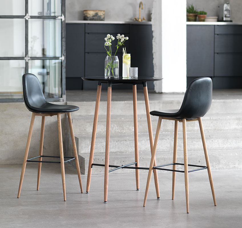 JONSTRUP bar stool and table in black faux leather and legs in oak A set of bar stools and table in black and oak
