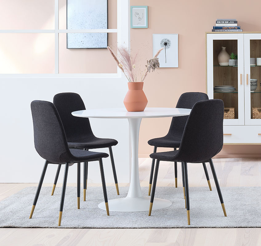 JONSTRUP dining chair in black and gold as a contrast to the white and round dining table RINGSTED Modern dining chairs in black and gold around a white, round table