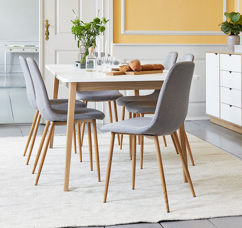 Dining room with dining table and 6 dining chairs around it