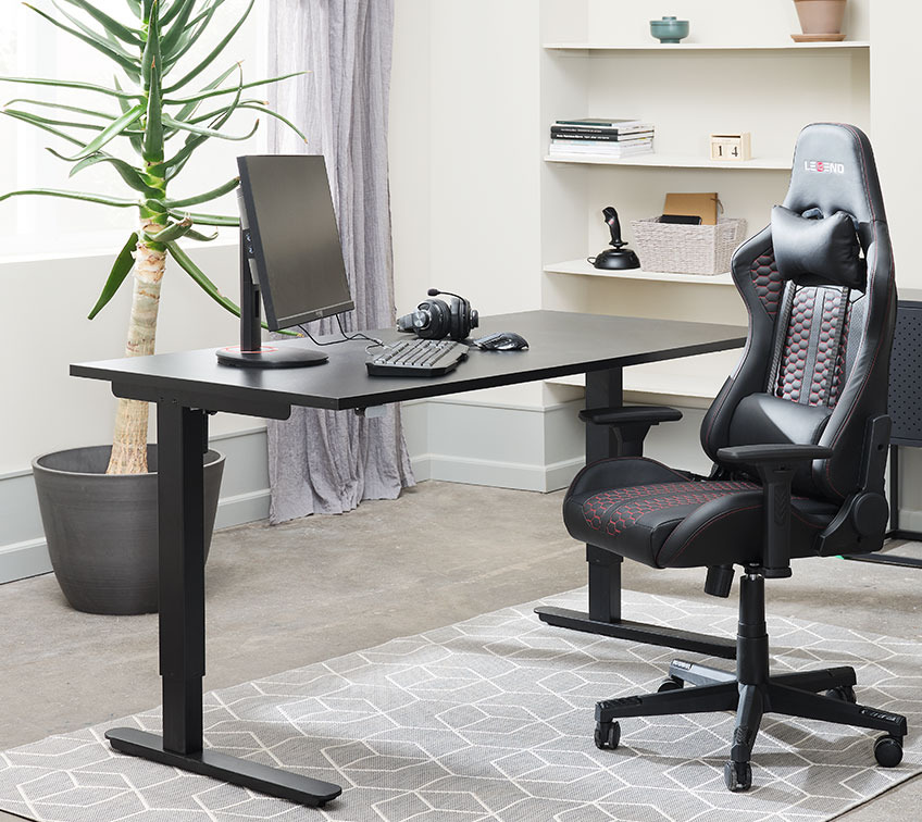 Adjustable desk and office chair in a home office 