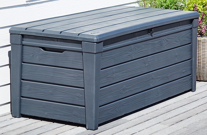 Grey cushion box on a wooden patio