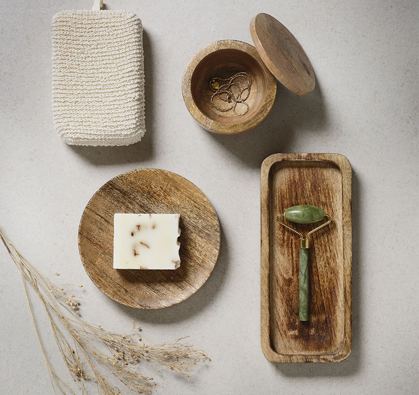 ARDALA trays and storage jar made from mango wood Wooden trays and jar with face roller and soap