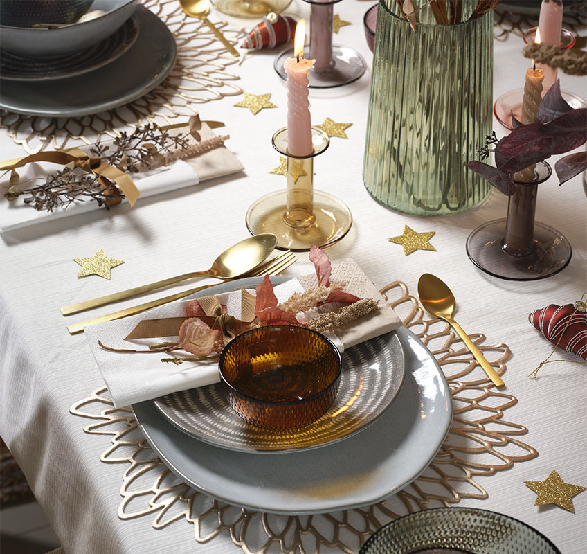 TONE and KLAUDI plates, JONAS bowl, EDGAR candlestick and BALDUR candle Grey and blue plates and gold cutlery on New Year’s table
