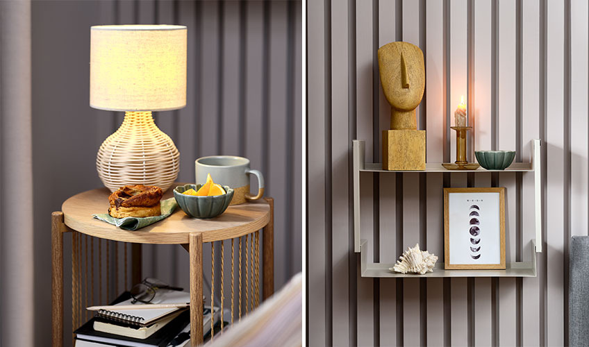 Bedside table, table lamp and shelf with sculpture and other decorative items  