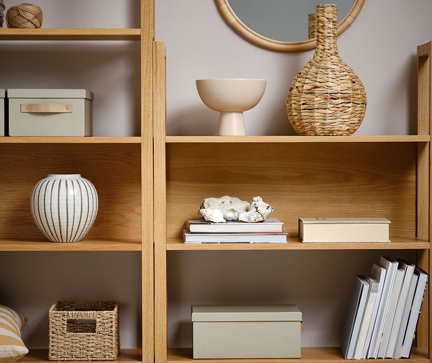 RY bookcase with BJERKE vase, SOFUS stoneware vase, CHRIS bowl and FJORDUR storage boxes Bookcase with wicker vase, bowl, storage boxes and other decorative items