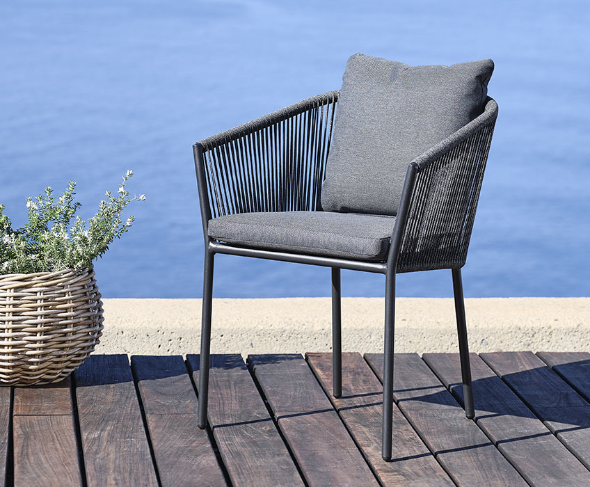 Grey stacking chair with quick-dry cushions