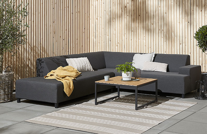 Lounge set with GAMST lounge table and UHRE lounge sofa Large garden lounge sofa with wood lounge table