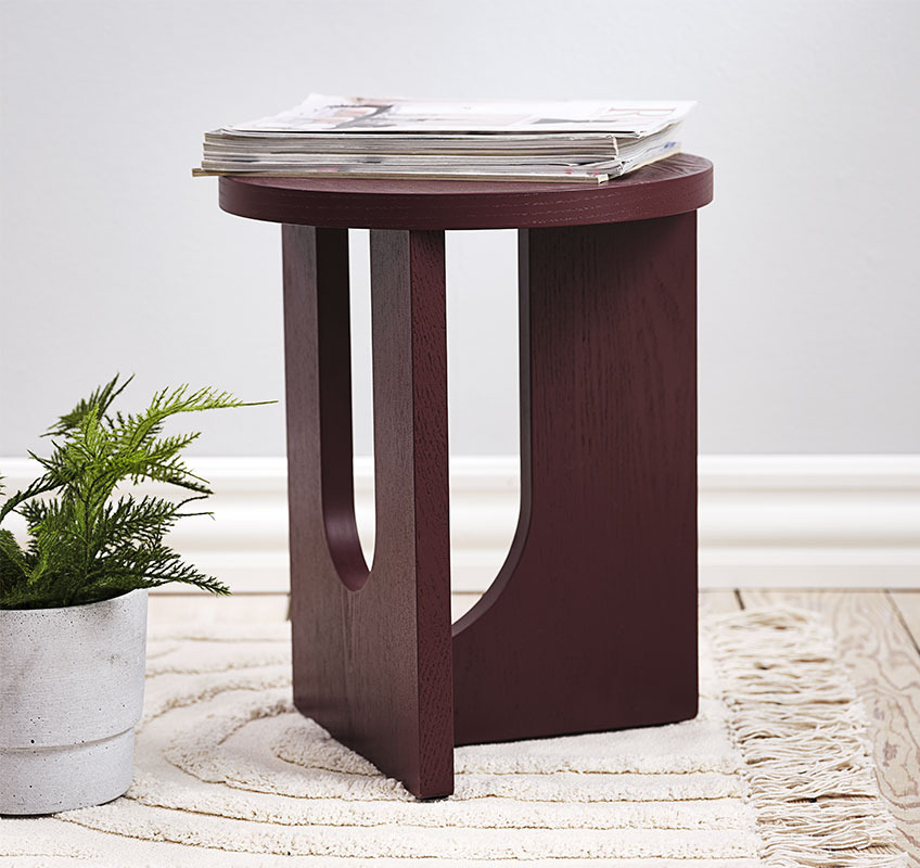 ARCH end table Burgundy end table with round sculptural carvings